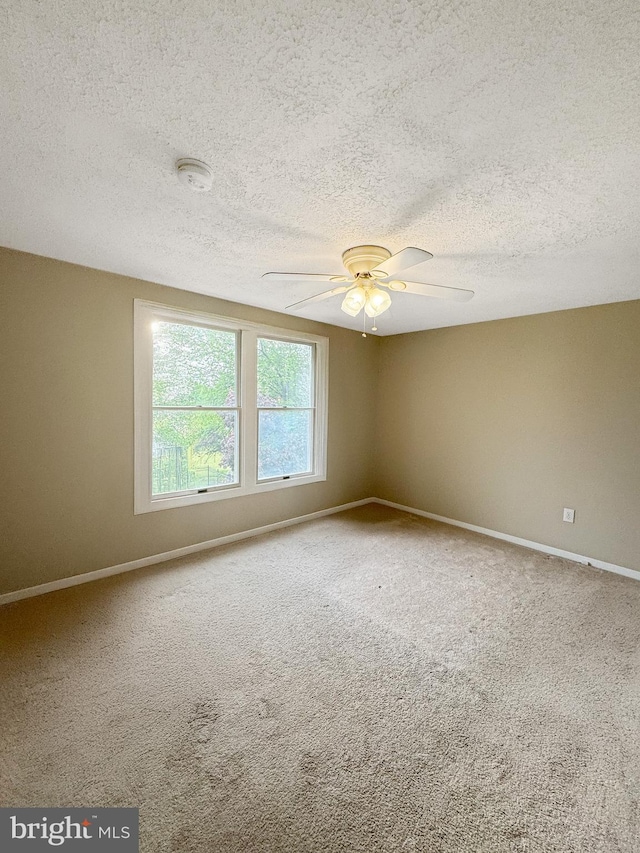 7 E Hart St, Winchester, VA 22601 - carpeted empty room with baseboards, a ceiling fan, a textured ceiling, and a smoke detector