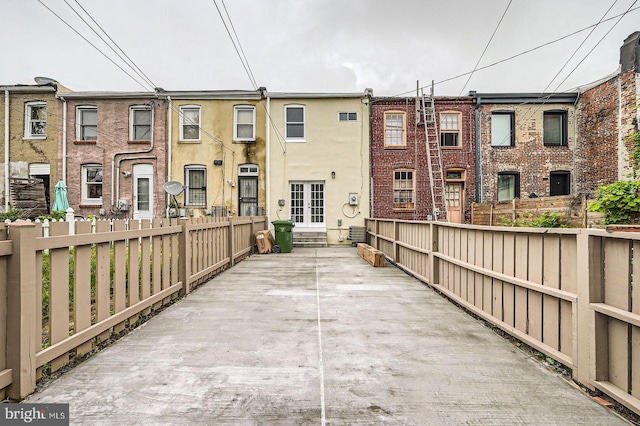 view of patio featuring fence