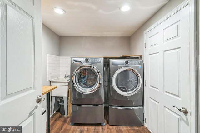 1153 N Hancock St, Philadelphia, PA 19123 - washroom with washer and clothes dryer, dark wood-type flooring, and recessed lighting