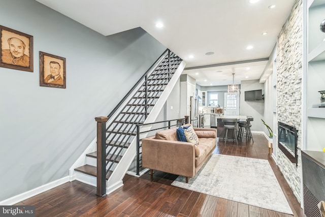 1153 N Hancock St, Philadelphia, PA 19123 - living room with hardwood / wood-style flooring, stairs, a fireplace, baseboards, and recessed lighting