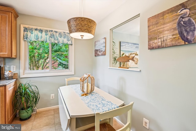 7912 Glengary Ct, Glen Burnie, MD 21061 - dining room with light tile patterned flooring and baseboards