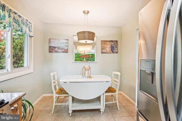 7912 Glengary Ct, Glen Burnie, MD 21061 - dining space with light tile patterned floors and baseboards