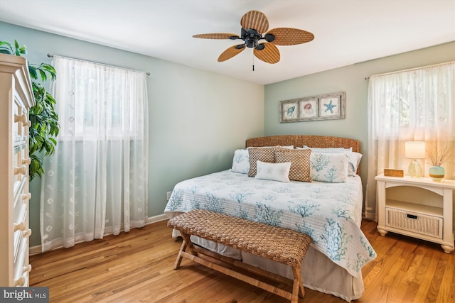 7912 Glengary Ct, Glen Burnie, MD 21061 - bedroom with multiple windows, wood finished floors, baseboards, and a ceiling fan