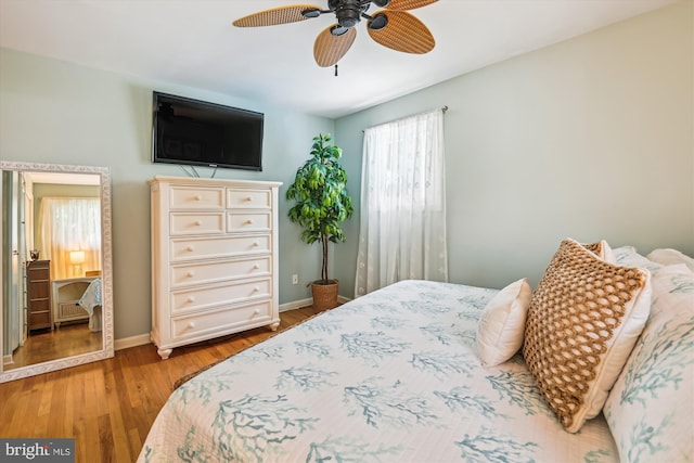 7912 Glengary Ct, Glen Burnie, MD 21061 - bedroom with wood finished floors, baseboards, and a ceiling fan