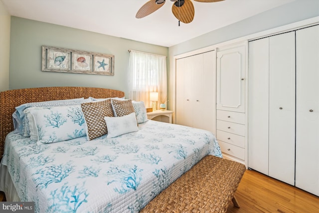 7912 Glengary Ct, Glen Burnie, MD 21061 - bedroom featuring wood finished floors, multiple closets, and a ceiling fan