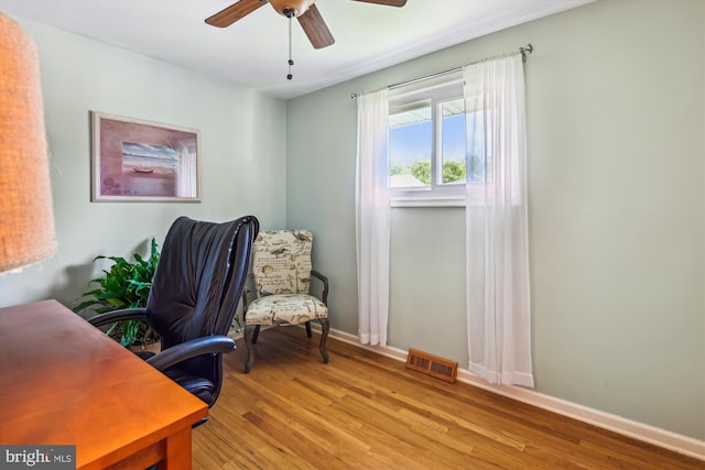 7912 Glengary Ct, Glen Burnie, MD 21061 - home office with wood finished floors, a ceiling fan, and baseboards