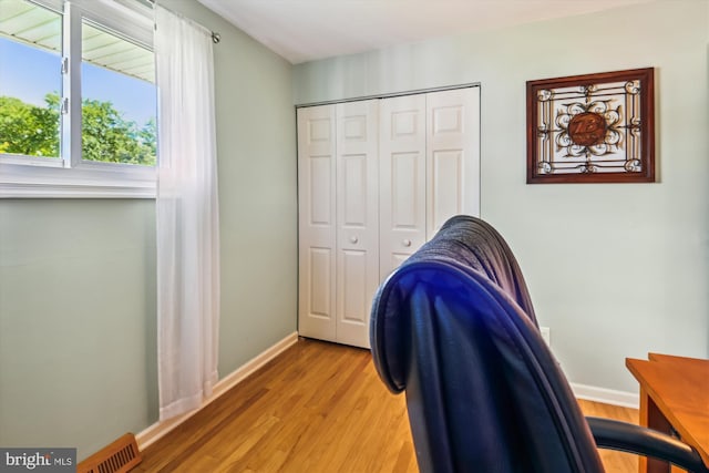 7912 Glengary Ct, Glen Burnie, MD 21061 - home office with baseboards and light wood-style flooring