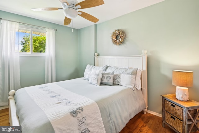 7912 Glengary Ct, Glen Burnie, MD 21061 - bedroom featuring wood finished floors, baseboards, and a ceiling fan