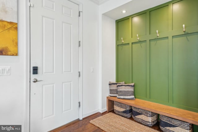42004 Donnington Pl, Ashburn, VA 20148 - mudroom featuring dark wood-type flooring, baseboards, recessed lighting, and crown molding