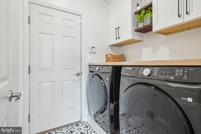 42004 Donnington Pl, Ashburn, VA 20148 - washroom with washer and dryer and cabinet space