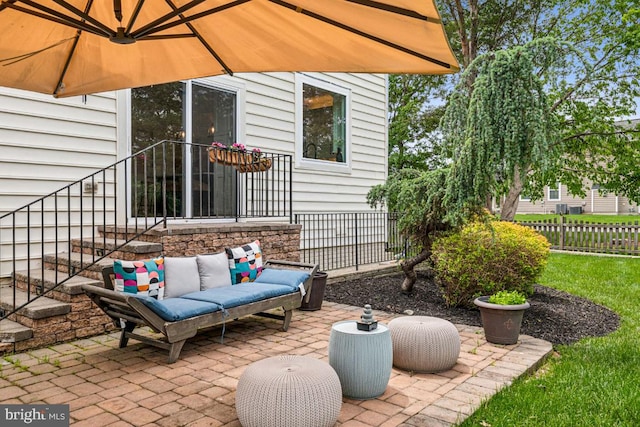 42004 Donnington Pl, Ashburn, VA 20148 - view of patio featuring fence and an outdoor living space
