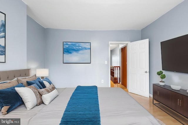 bedroom with light wood-style flooring