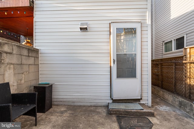 property entrance with fence