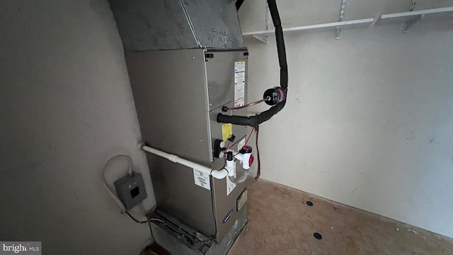 utility room with heating unit
