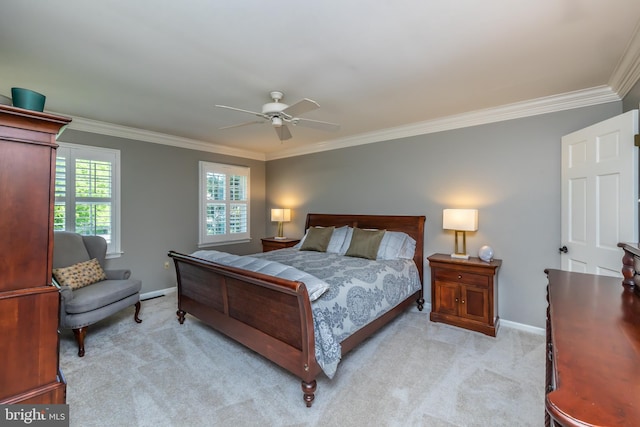 bedroom featuring crown molding, light carpet, baseboards, and ceiling fan