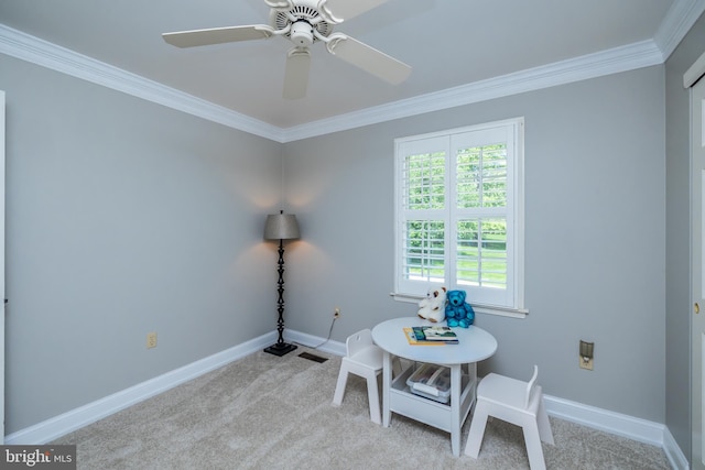rec room featuring plenty of natural light, carpet flooring, crown molding, baseboards, and ceiling fan