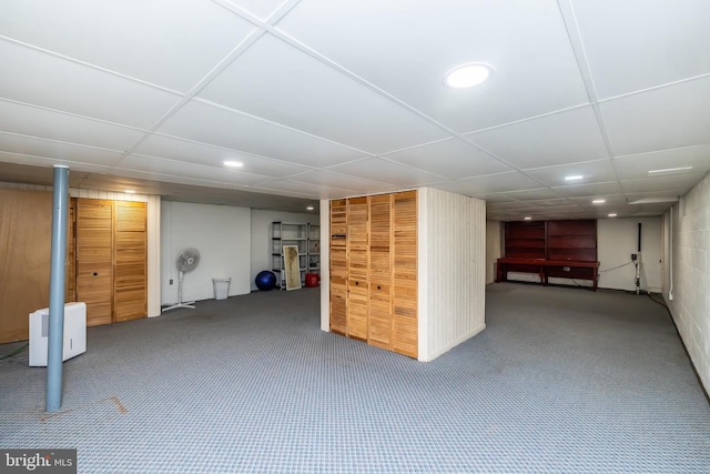 finished below grade area with recessed lighting, carpet, and a paneled ceiling