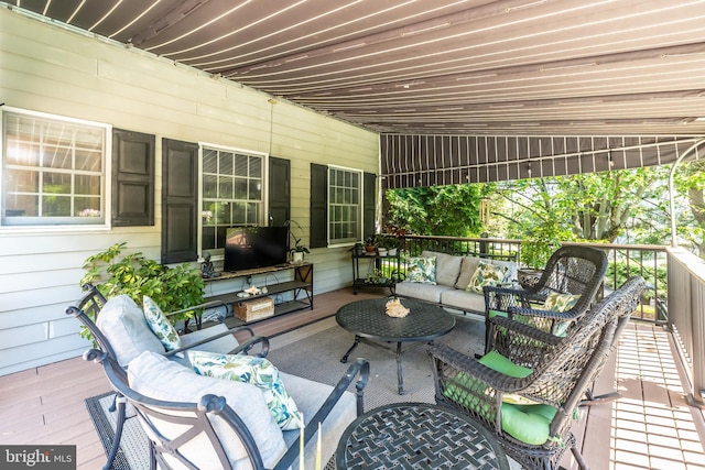 view of patio / terrace with outdoor lounge area and a wooden deck