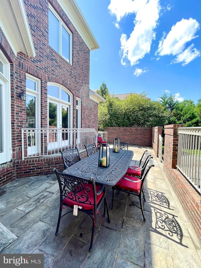 view of patio / terrace with french doors and outdoor dining space