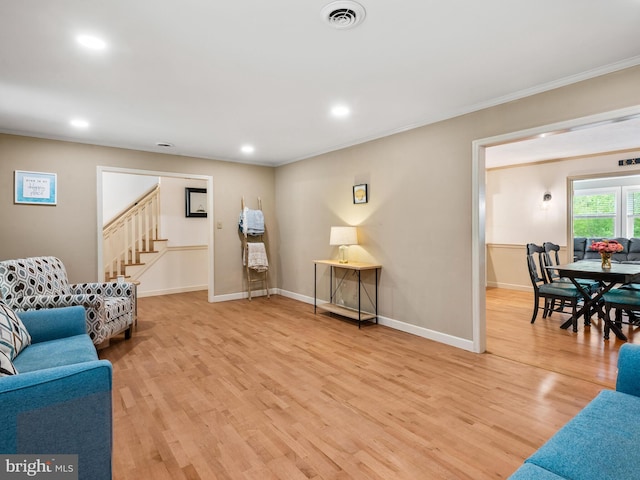 51 Seminary Rd, Glenmoore, PA 19343 - living room featuring stairway, ornamental molding, light wood-type flooring, recessed lighting, and baseboards