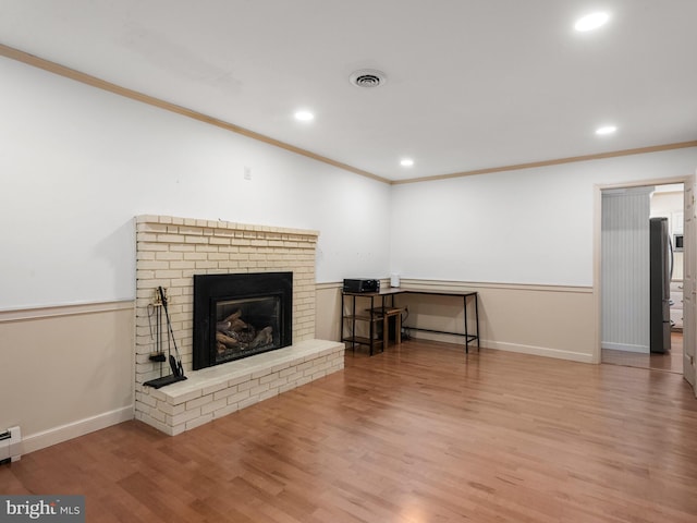 51 Seminary Rd, Glenmoore, PA 19343 - living room featuring ornamental molding, wood finished floors, recessed lighting, a brick fireplace, and baseboards