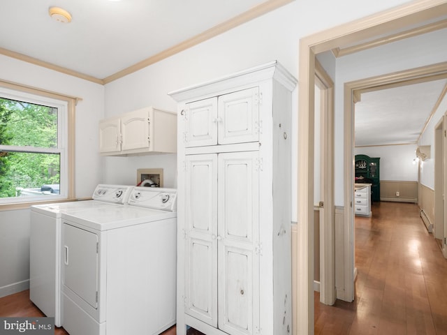 51 Seminary Rd, Glenmoore, PA 19343 - laundry room with cabinet space, washing machine and clothes dryer, ornamental molding, a wainscoted wall, and wood finished floors