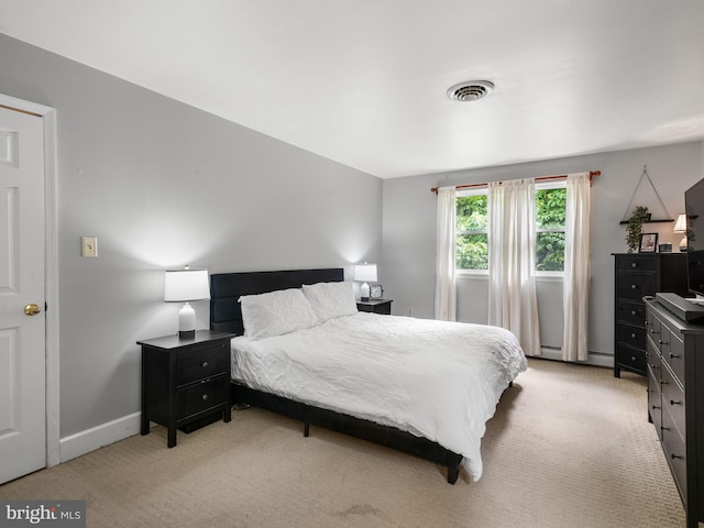 51 Seminary Rd, Glenmoore, PA 19343 - bedroom featuring light colored carpet, baseboards, and a baseboard heating unit
