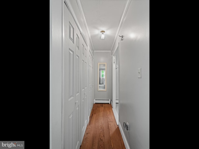 51 Seminary Rd, Glenmoore, PA 19343 - hallway with a baseboard radiator, ornamental molding, light wood finished floors, and baseboards