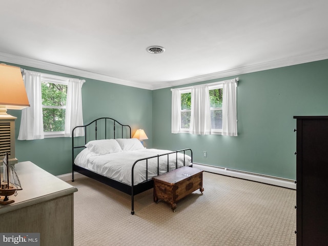 51 Seminary Rd, Glenmoore, PA 19343 - bedroom with a baseboard radiator, multiple windows, baseboards, carpet flooring, and crown molding