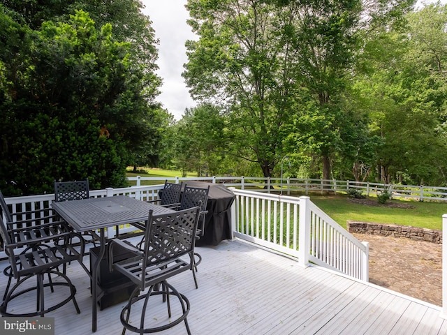 51 Seminary Rd, Glenmoore, PA 19343 - wooden deck featuring outdoor dining area and view of scattered trees