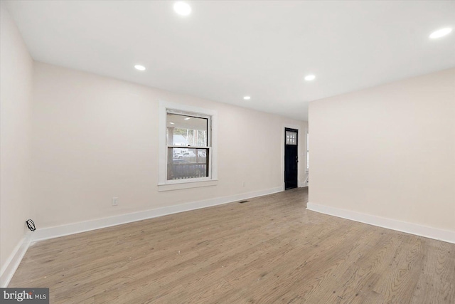 8422 Newark Rd, Newark, MD 21841 - empty room with light wood finished floors, recessed lighting, and baseboards