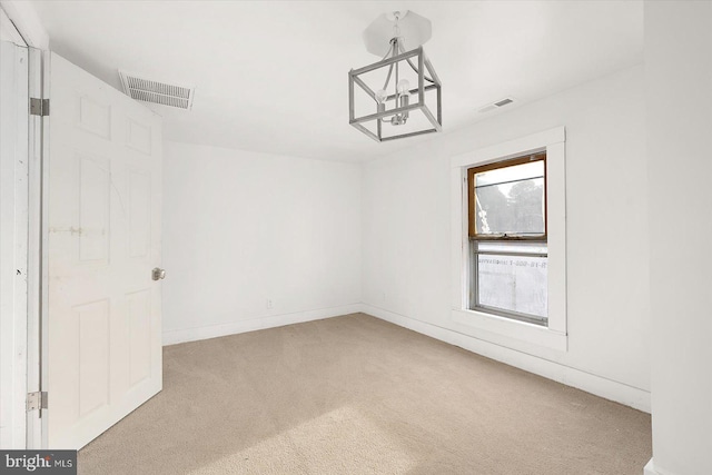 8422 Newark Rd, Newark, MD 21841 - carpeted empty room featuring a chandelier and baseboards
