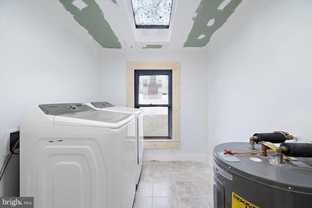 8422 Newark Rd, Newark, MD 21841 - laundry room with electric water heater, independent washer and dryer, light tile patterned floors, and baseboards