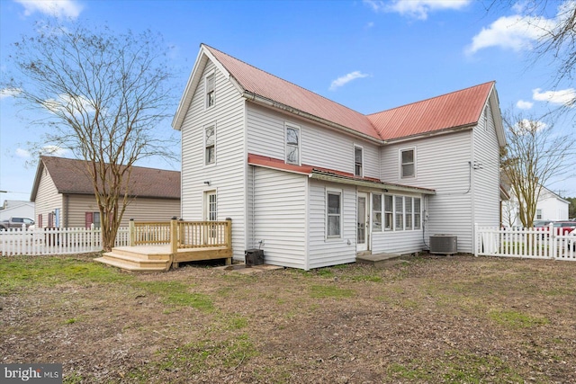 8422 Newark Rd, Newark, MD 21841 - back of house with a wooden deck, a fenced backyard, metal roof, and central AC