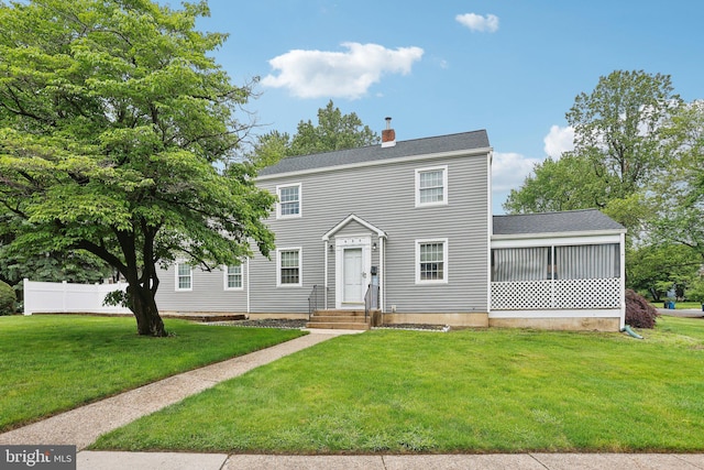 430 W Palmer St, Morrisville, PA 19067 - colonial home featuring a chimney and roof with shingles