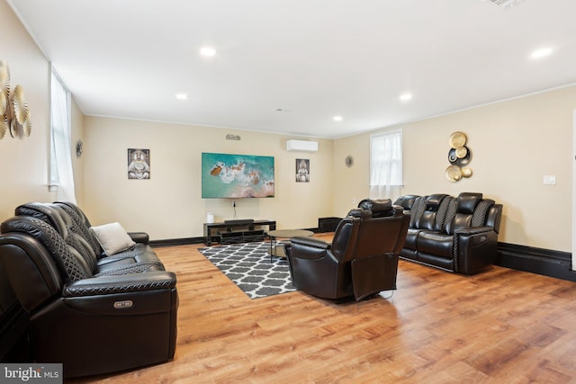 430 W Palmer St, Morrisville, PA 19067 - living area with light wood finished floors, recessed lighting, an AC wall unit, and crown molding