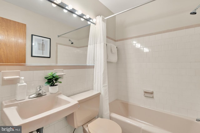 6008 Hawthorne St, Cheverly, MD 20785 - full bath with shower / bath combo, a sink, toilet, and tile walls