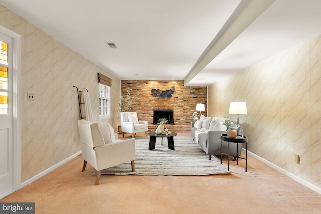 6008 Hawthorne St, Cheverly, MD 20785 - living area featuring carpet, baseboards, and a brick fireplace