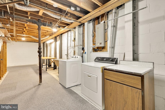 6008 Hawthorne St, Cheverly, MD 20785 - unfinished basement with separate washer and dryer, electric panel, and light carpet
