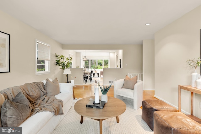 6008 Hawthorne St, Cheverly, MD 20785 - living room featuring wood finished floors, baseboards, and recessed lighting