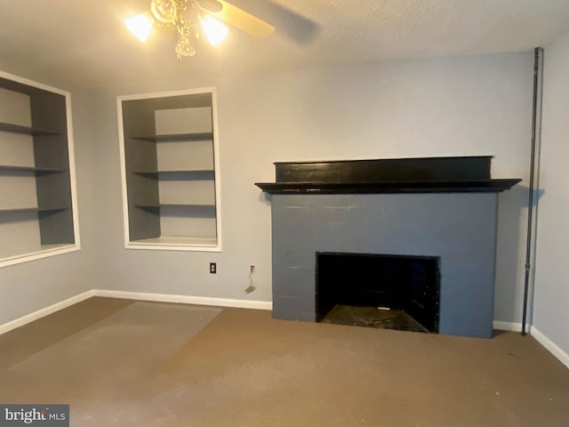 unfurnished living room featuring baseboards, a fireplace, carpet, and a ceiling fan