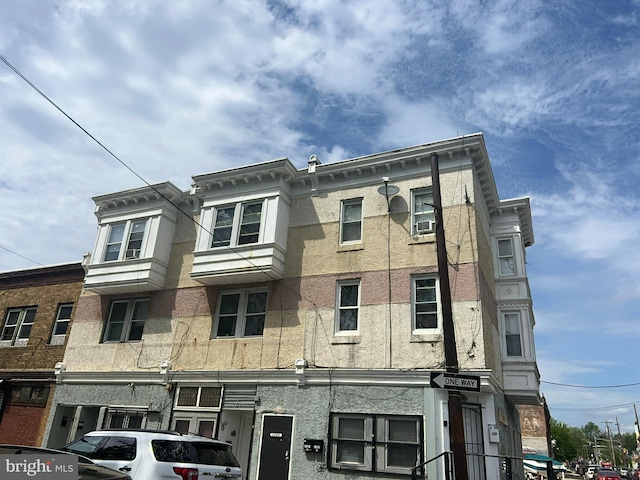 view of building exterior featuring cooling unit