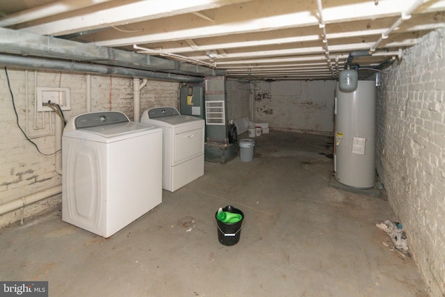 unfinished below grade area with water heater and separate washer and dryer