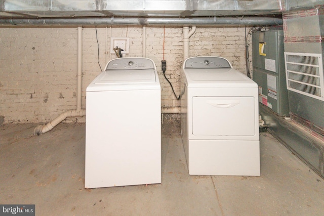 laundry area featuring washing machine and dryer