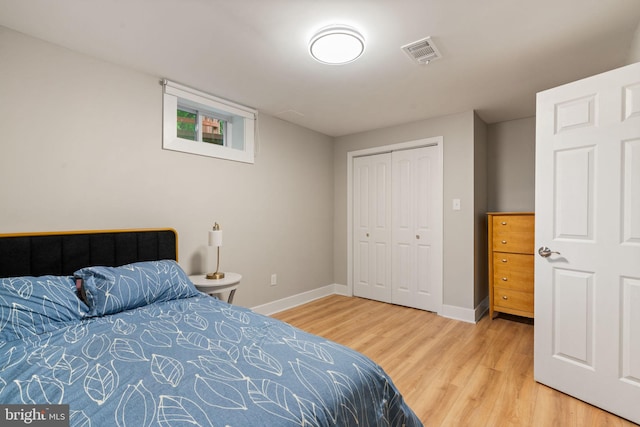 6415 Wilcox Ct, Alexandria, VA 22310 - bedroom with wood finished floors, baseboards, and a closet
