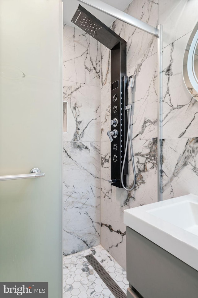 6415 Wilcox Ct, Alexandria, VA 22310 - bathroom featuring a marble finish shower and vanity