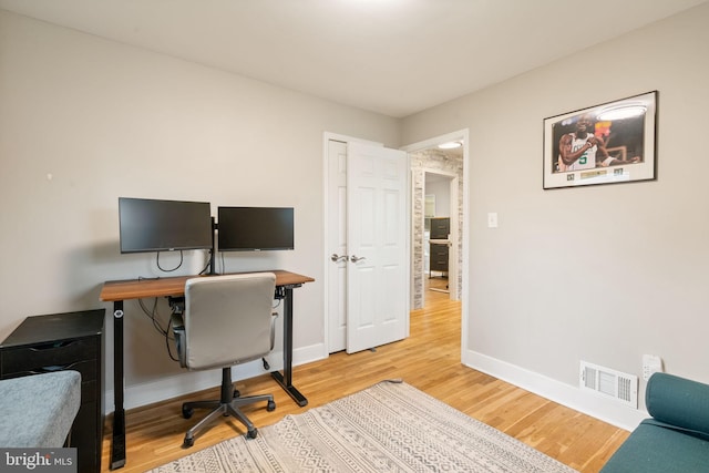 6415 Wilcox Ct, Alexandria, VA 22310 - home office with light wood finished floors and baseboards