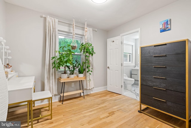 6415 Wilcox Ct, Alexandria, VA 22310 - living area with light wood-type flooring and baseboards
