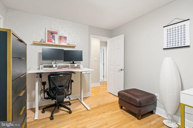 6415 Wilcox Ct, Alexandria, VA 22310 - home office with light wood-style flooring and baseboards