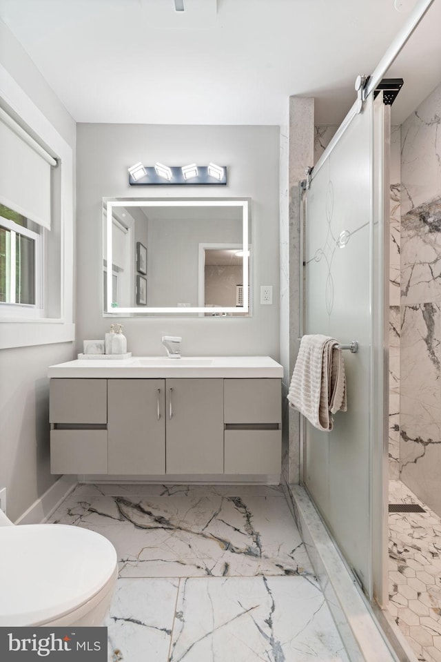 6415 Wilcox Ct, Alexandria, VA 22310 - full bathroom with marble finish floors, a shower stall, vanity, and toilet